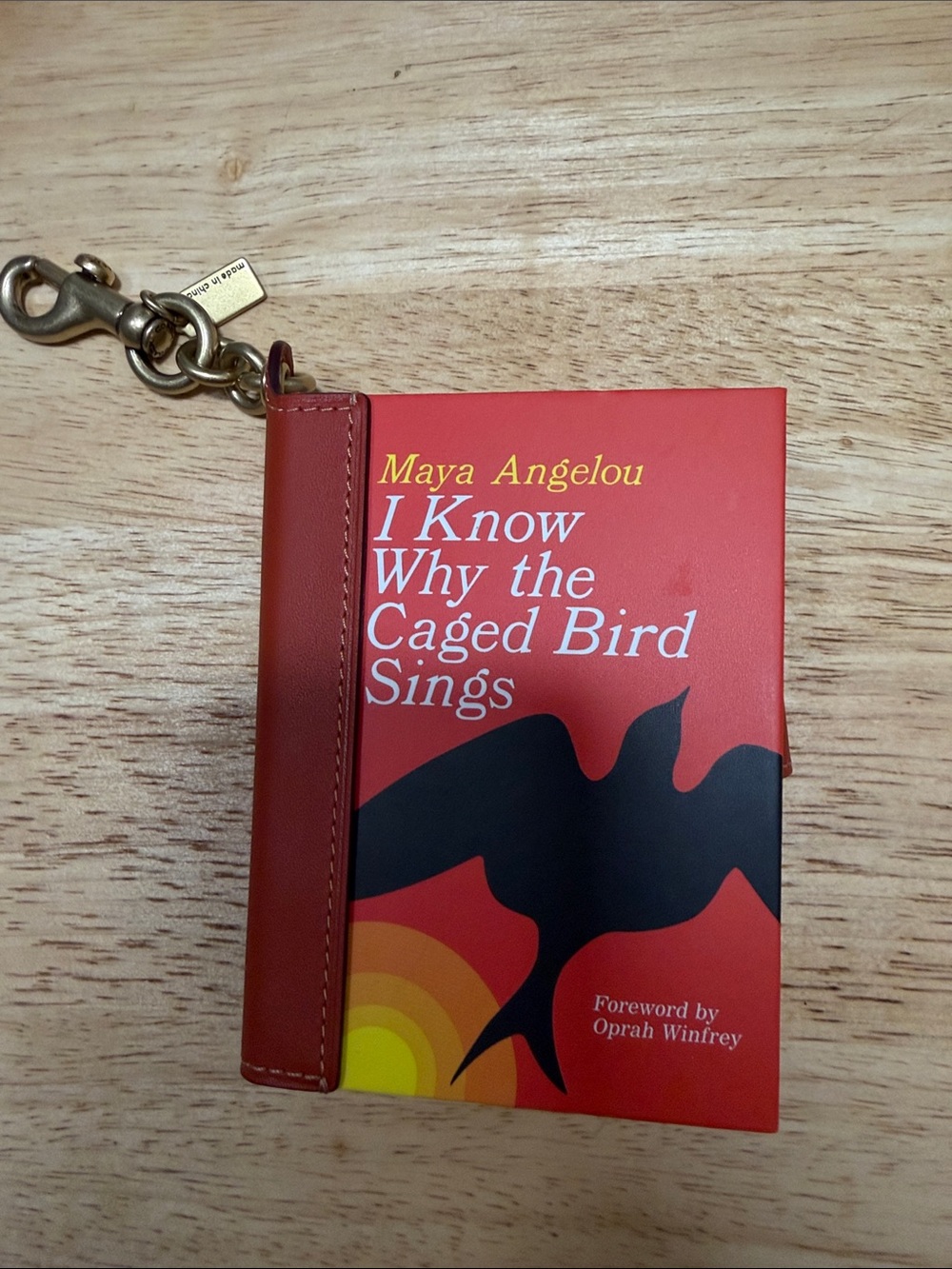 Coach Red and Black Maya Angelou Book Keychain